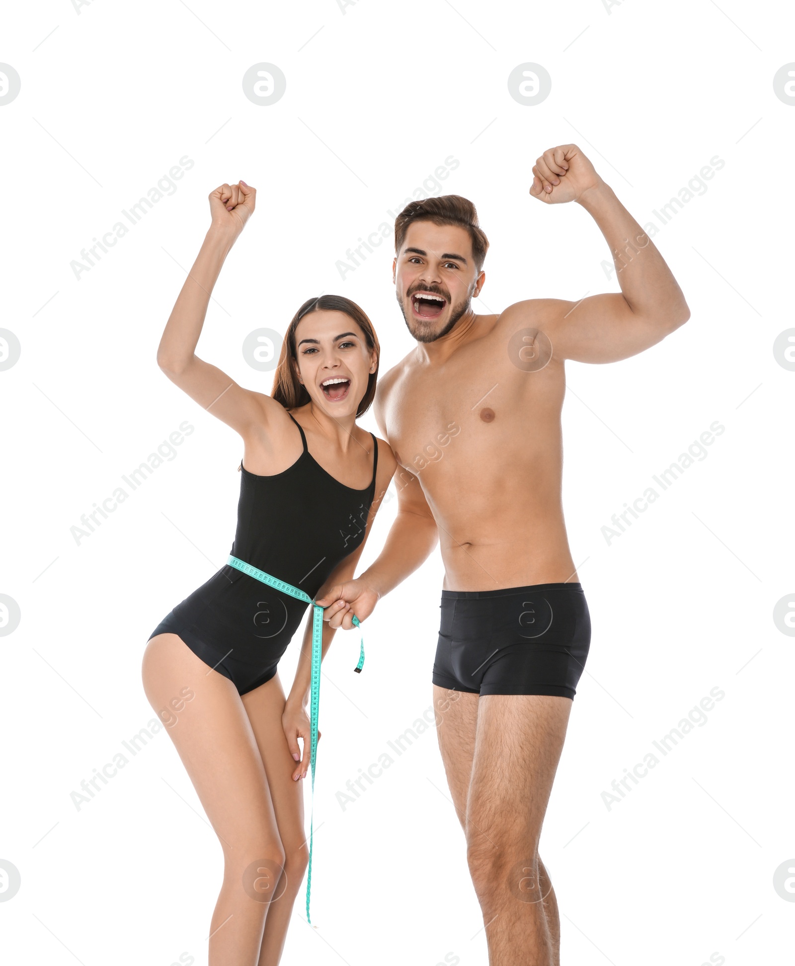 Photo of Fit people with measuring tape on white background. Weight loss