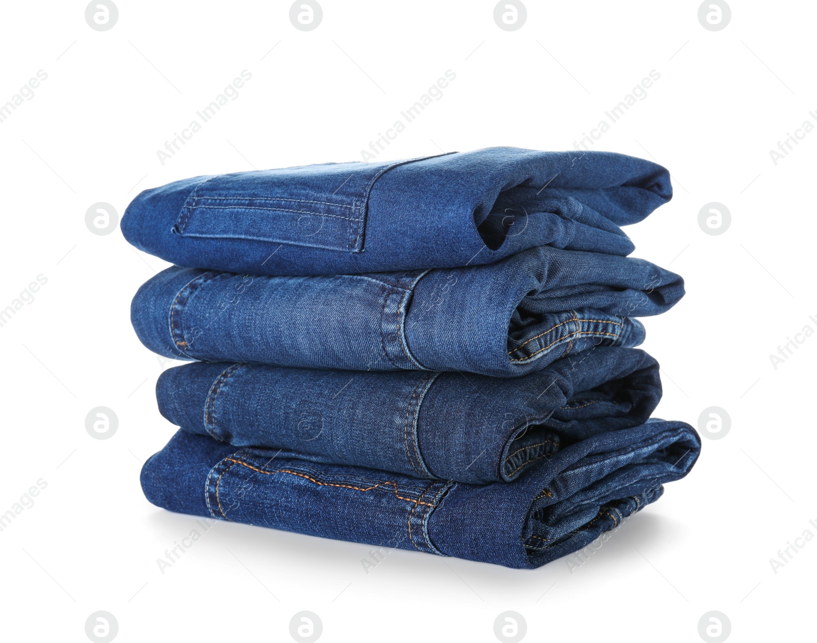 Photo of Stack of different jeans isolated on white