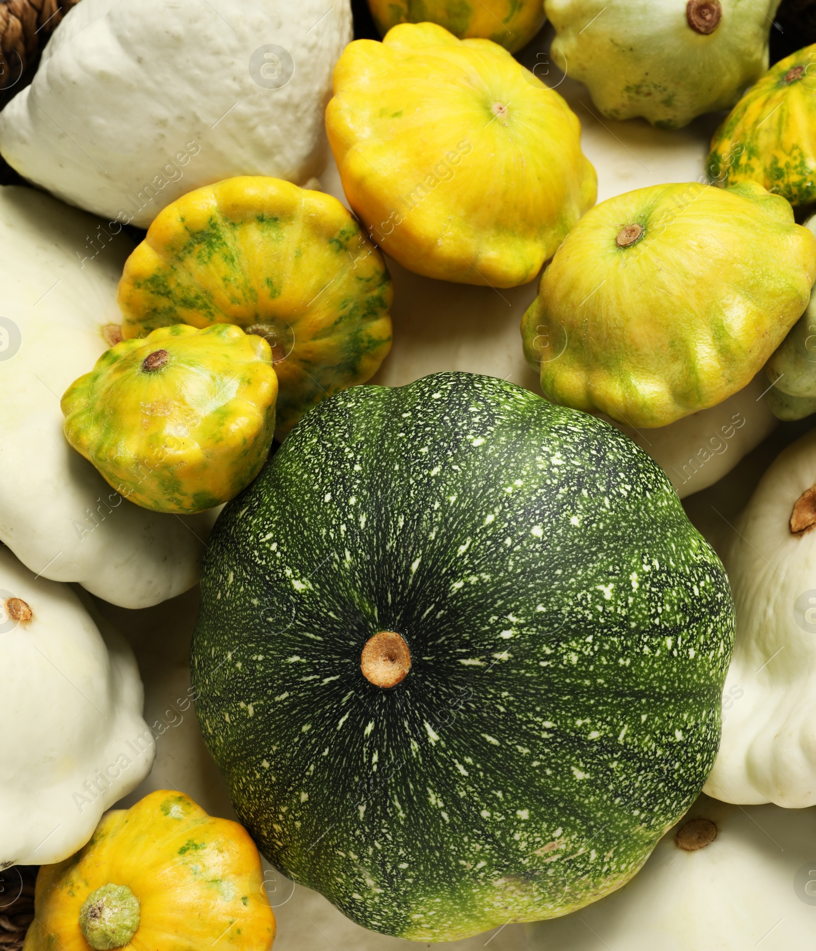 Photo of Fresh ripe pattypan squashes as background, top view