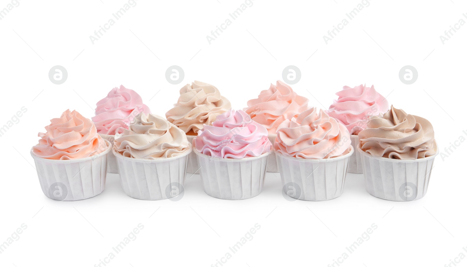 Photo of Tasty cupcakes with cream isolated on white