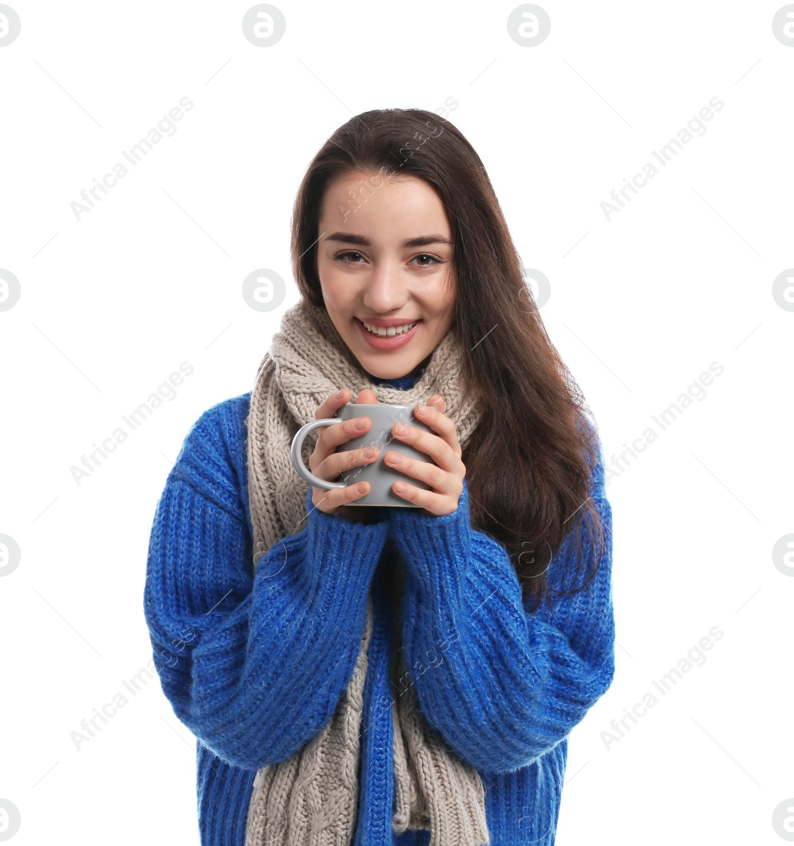 Photo of Young woman with cup of hot coffee on white background. Winter season