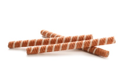 Tasty wafer roll sticks on white background. Crispy food