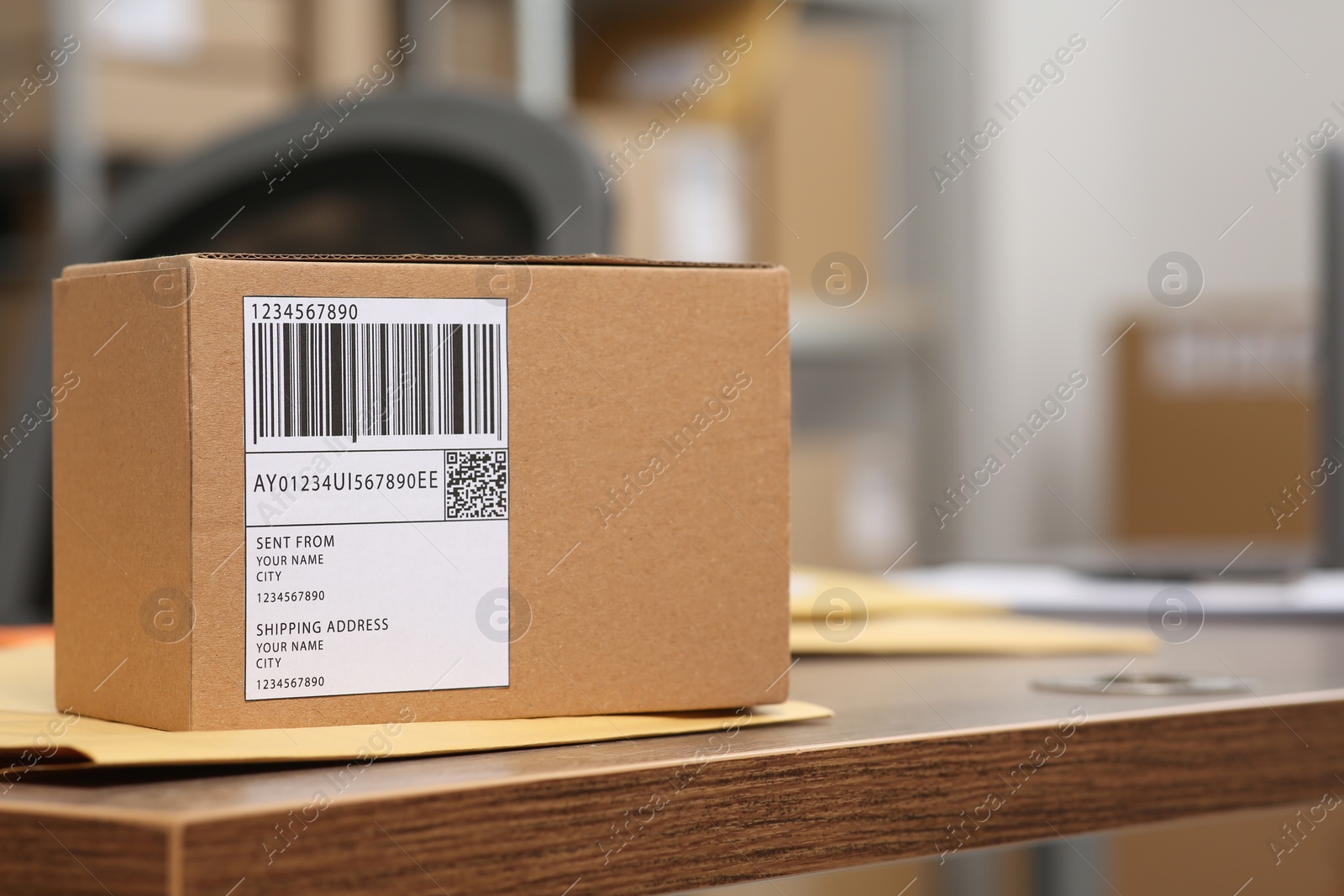 Photo of Parcel on wooden table in office, space for text. Online store