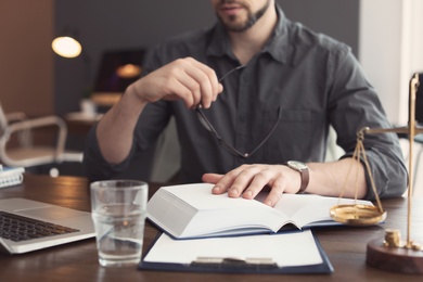 Male lawyer working in office