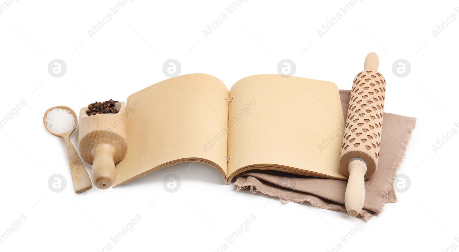 Photo of Blank recipe book, spices and wooden utensils on white background. Space for text