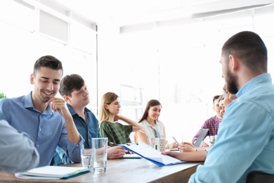 Young people having business training in office