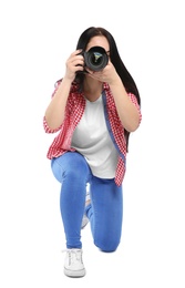 Female photographer with professional camera on white background