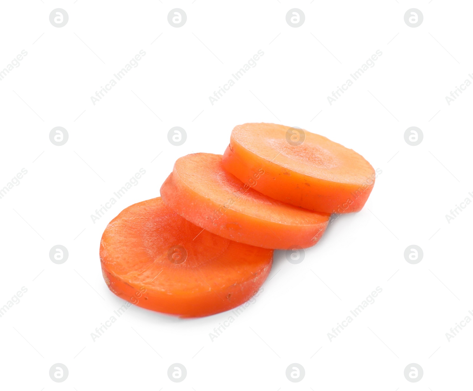 Slices of fresh ripe carrot isolated on white Photo of Slices of fresh ripe carrot isolated on white