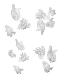 Set with used crumpled paper tissues on white background