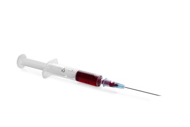 Photo of Plastic syringe with blood isolated on white