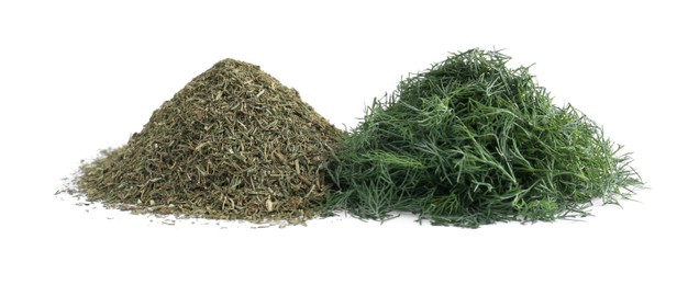 Piles of aromatic dry and fresh dill on white background
