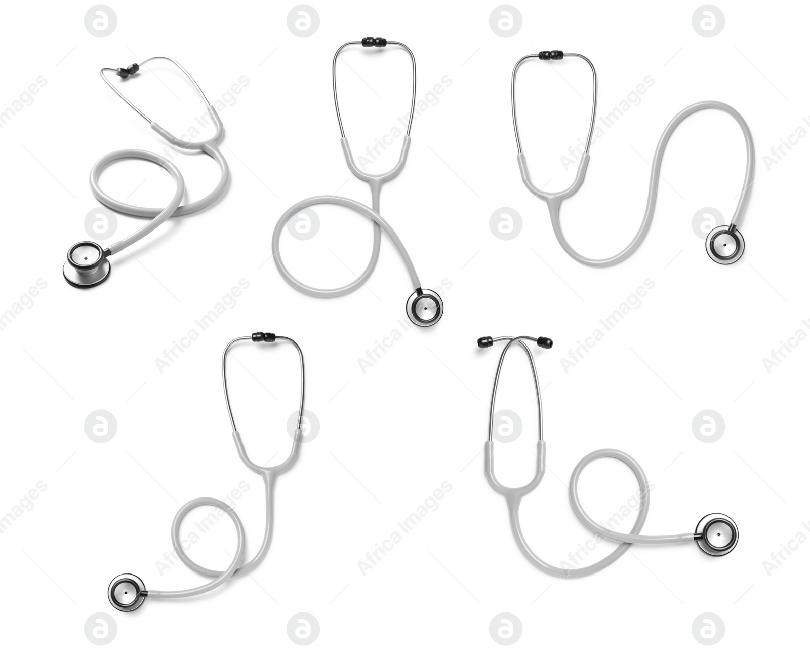 Image of Set with stethoscopes on white background 