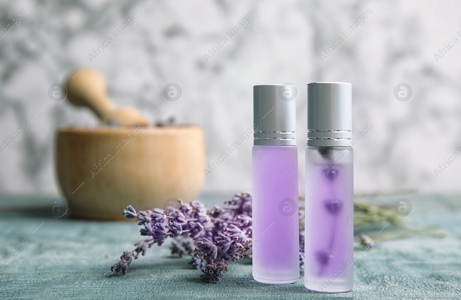 Photo of Composition with lavender flowers and natural cosmetic on table