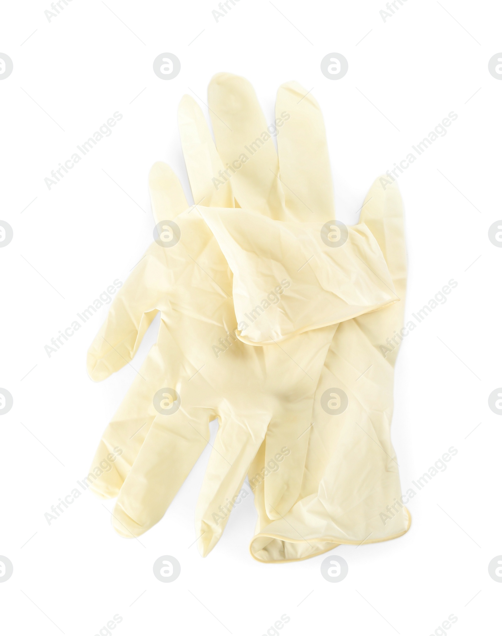 Photo of Pair of medical gloves isolated on white, top view