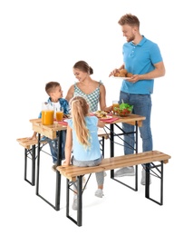 Photo of Happy family having picnic at table on white background