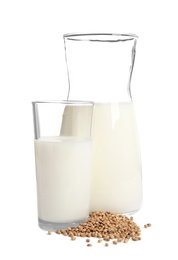 Photo of Glassware with hemp milk on white background