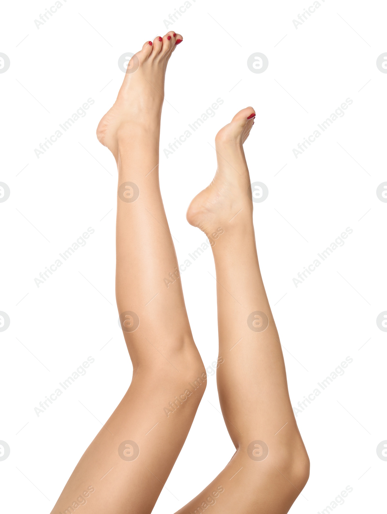 Photo of Woman with stylish red toenails after pedicure procedure isolated on white, closeup