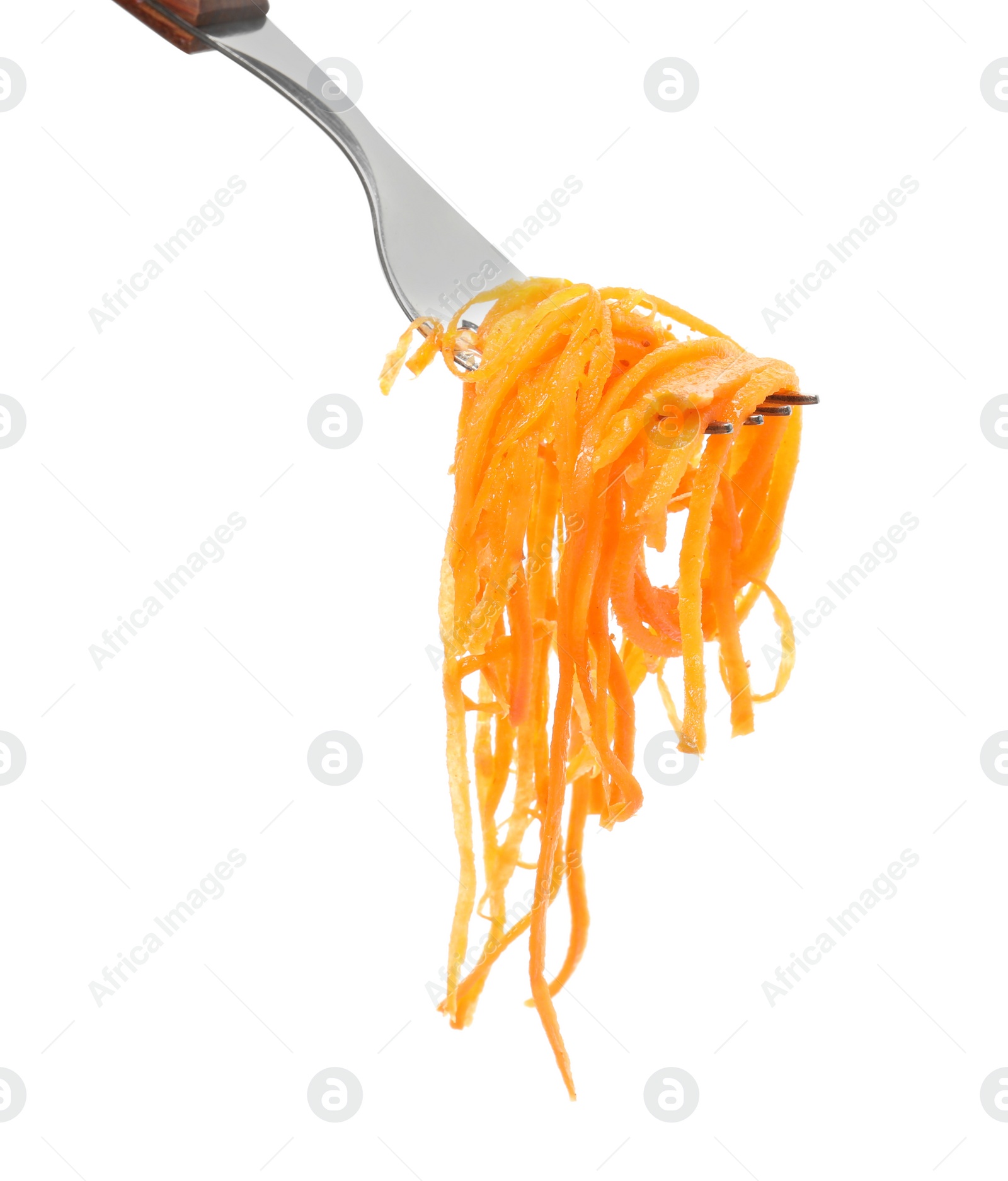 Photo of Fork with delicious Korean carrot salad on white background