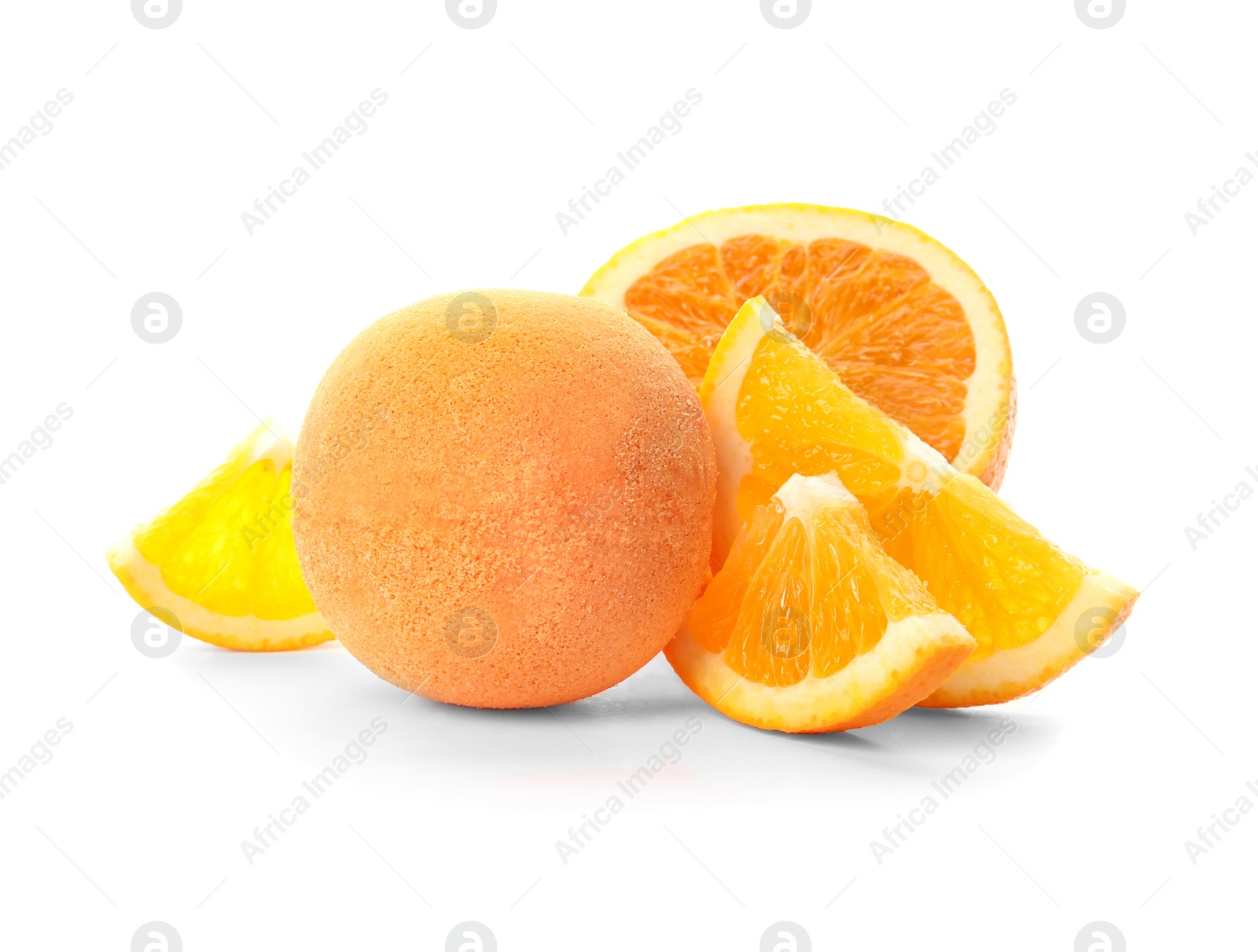 Photo of Bath bomb and orange slices on white background