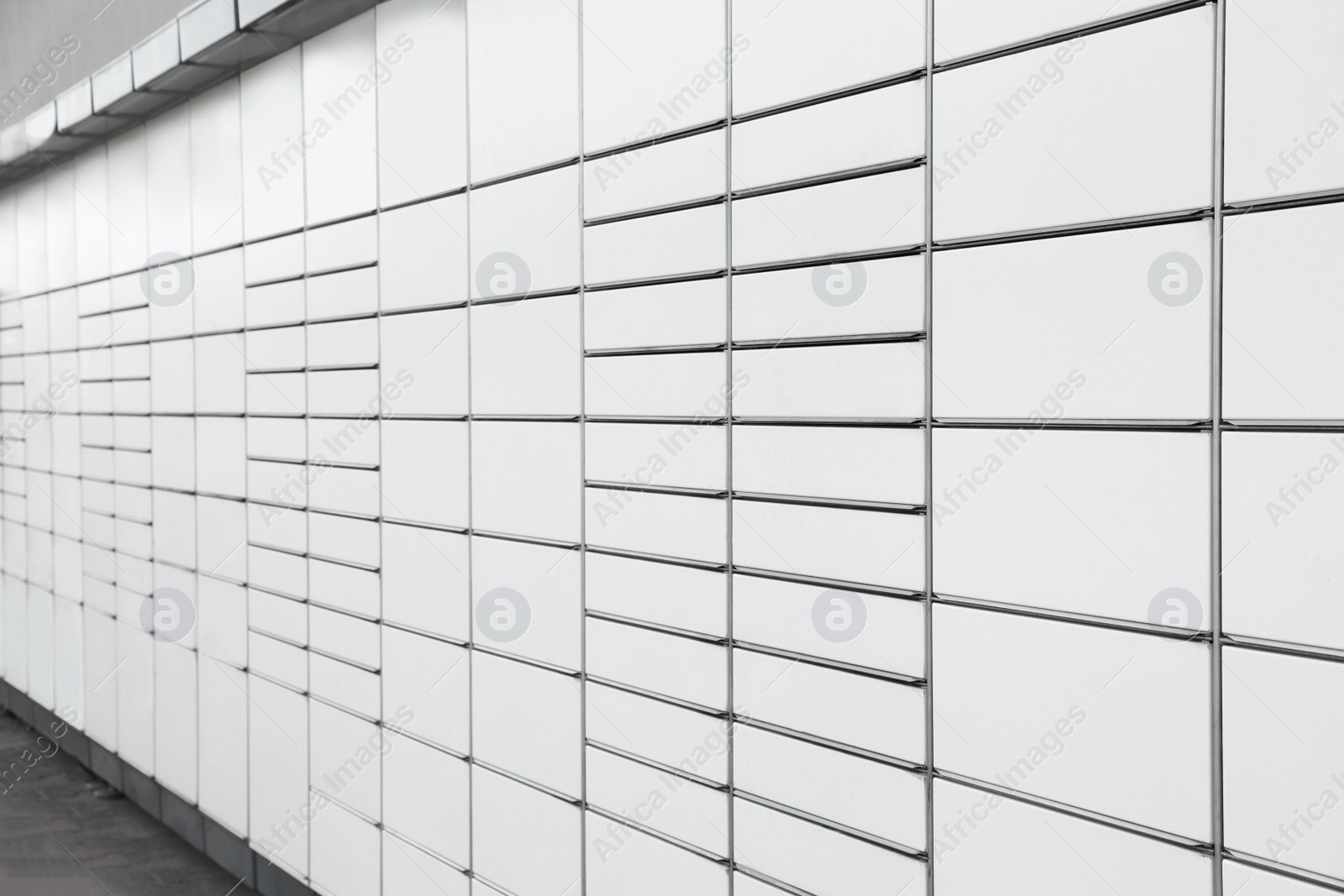 Photo of Modern parcel locker with many postal boxes