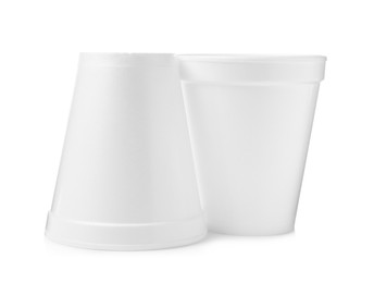 Photo of Two clean styrofoam cups on white background