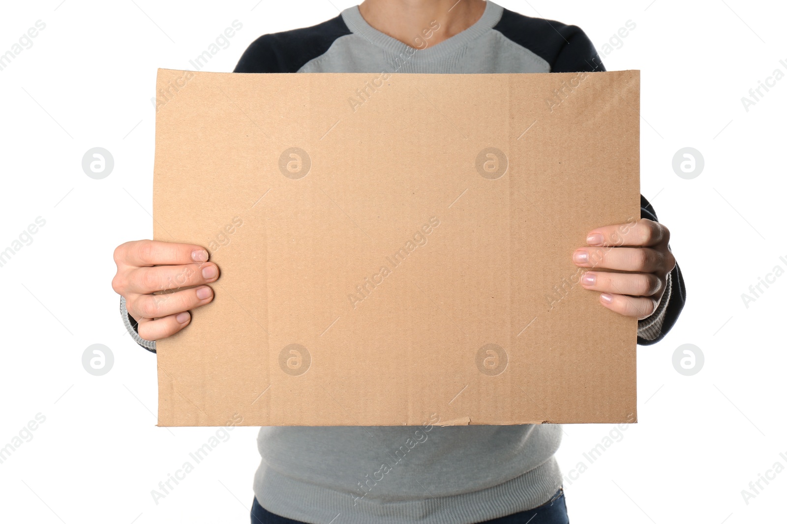 Photo of Woman holding piece of cardboard on white background, closeup. Space for text