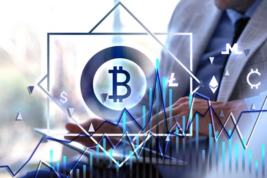 Image of Cryptocurrency. Businessman using tablet in office, closeup. Graphs and symbols