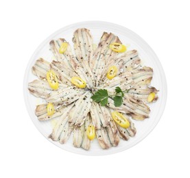 Tasty pickled anchovies with spices isolated on white, top view