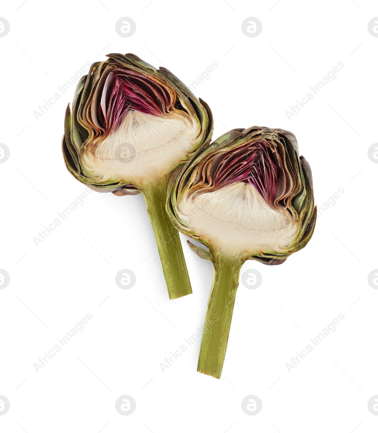 Photo of Halves of fresh raw artichoke on white background, top view