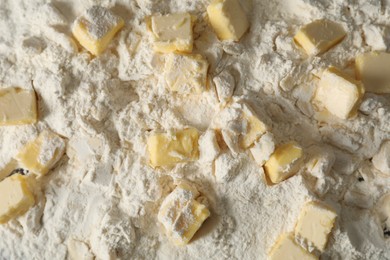 Making shortcrust pastry. Flour and butter as background, top view
