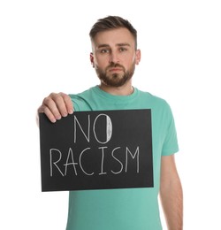 Photo of Young man holding sign with phrase No Racism on white background
