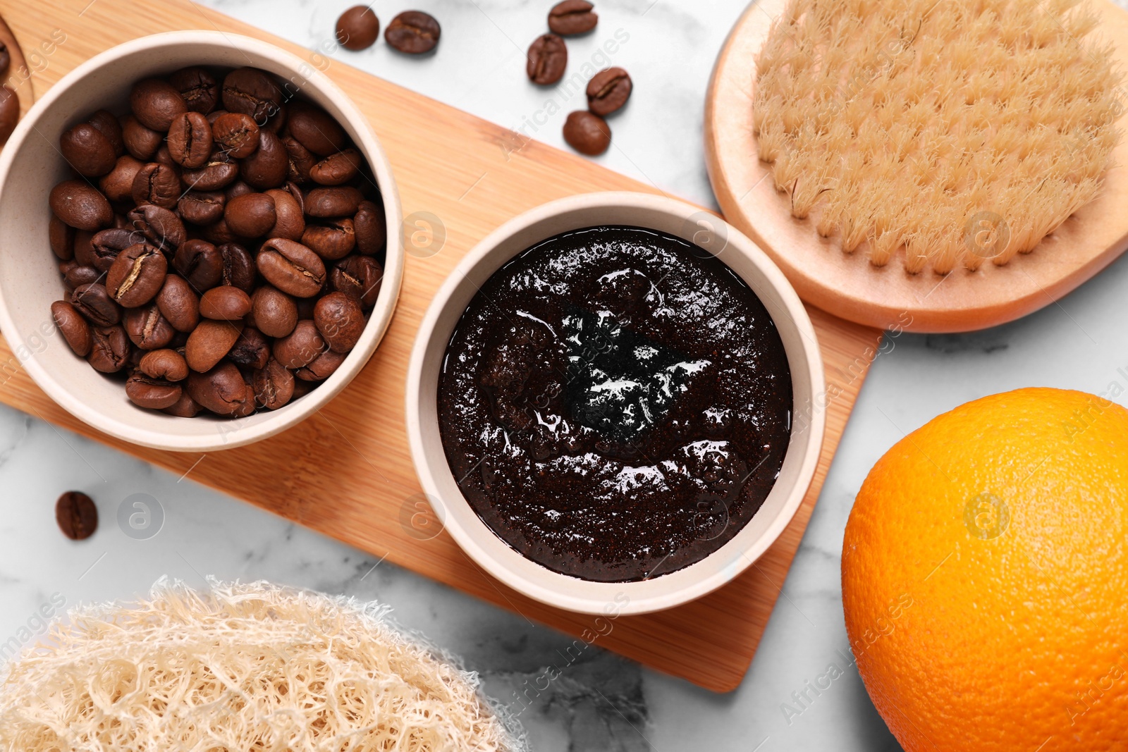 Photo of Flat lay composition with natural body scrub and fresh ingredients on white marble table. Anti cellulite treatment