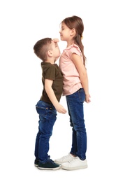 Little children measuring and comparing their height on white background