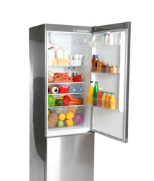 Open refrigerator with many different products on white background