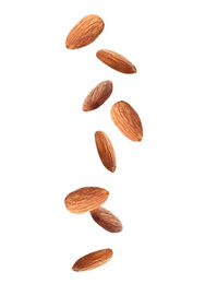 Image of Tasty almonds falling on white background 