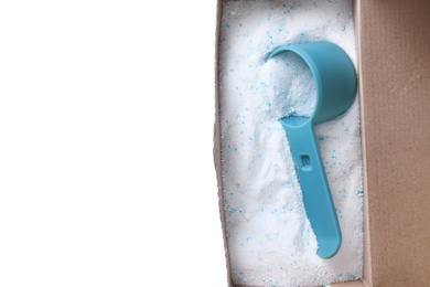 Photo of Open box with laundry powder and measuring spoon isolated on white, top view