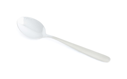 Photo of Clean shiny silver spoon isolated on white