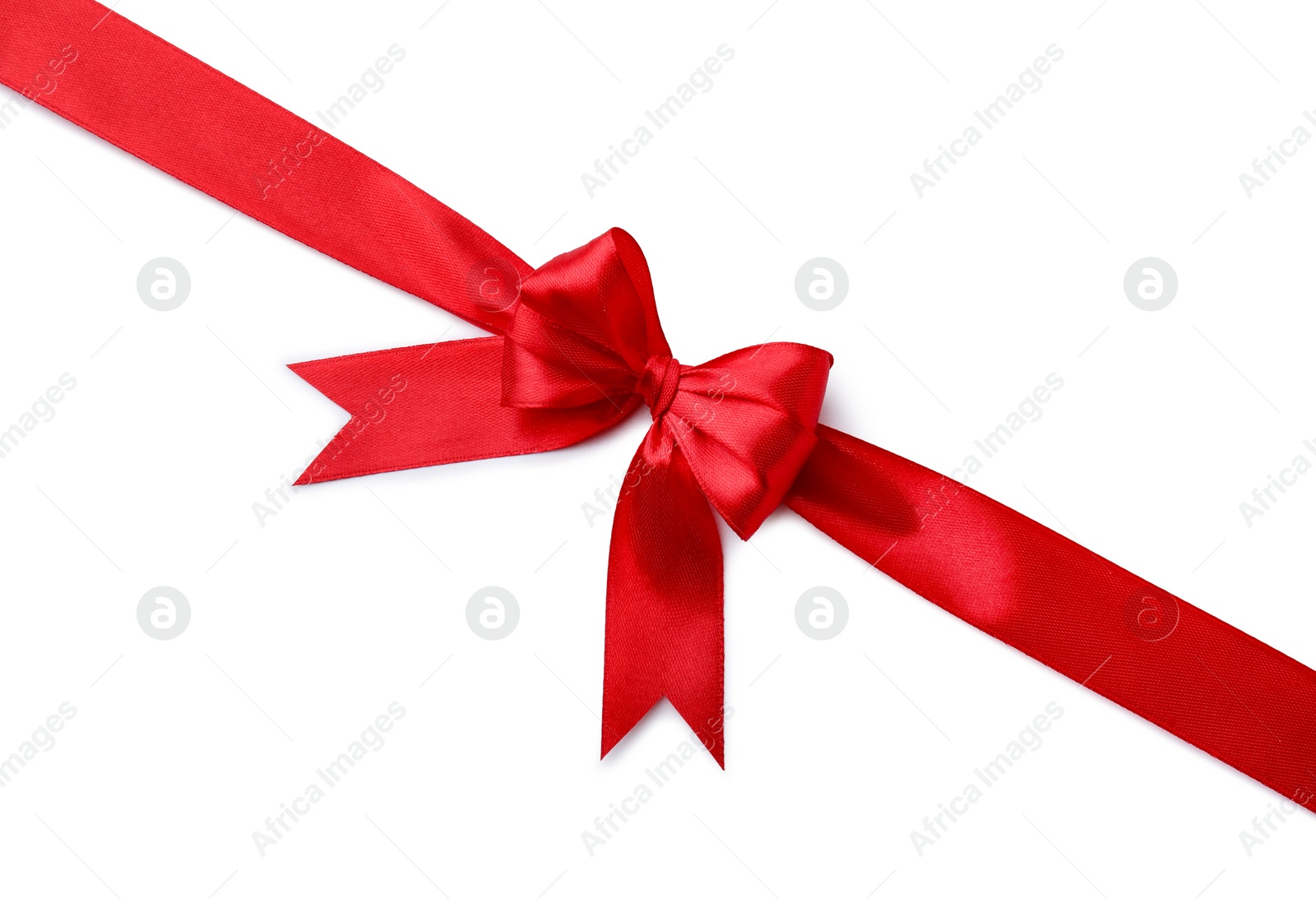 Photo of Red satin ribbon with bow isolated on white, top view