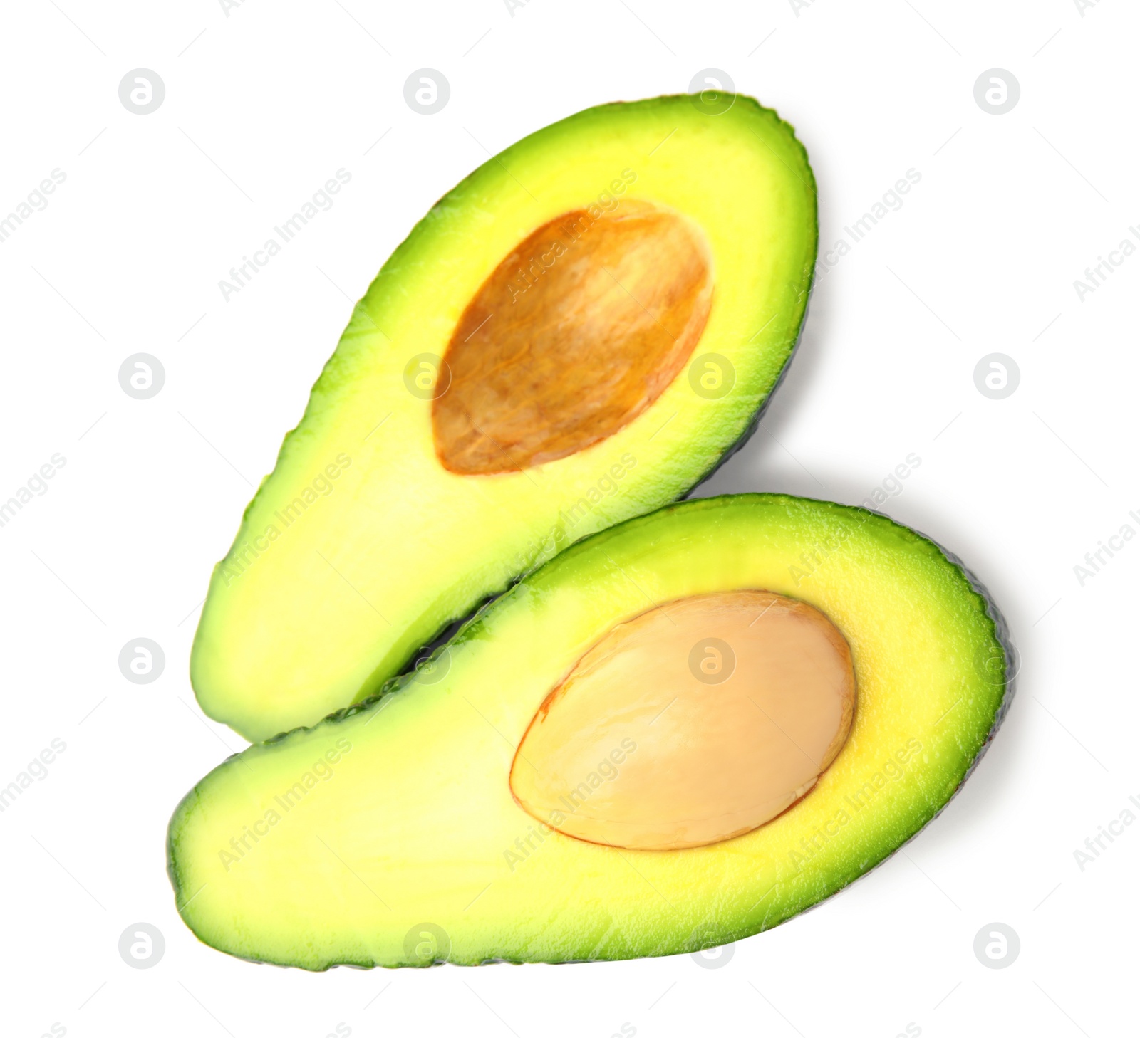 Photo of Cut tasty ripe avocados on white background, top view. Tropical fruit