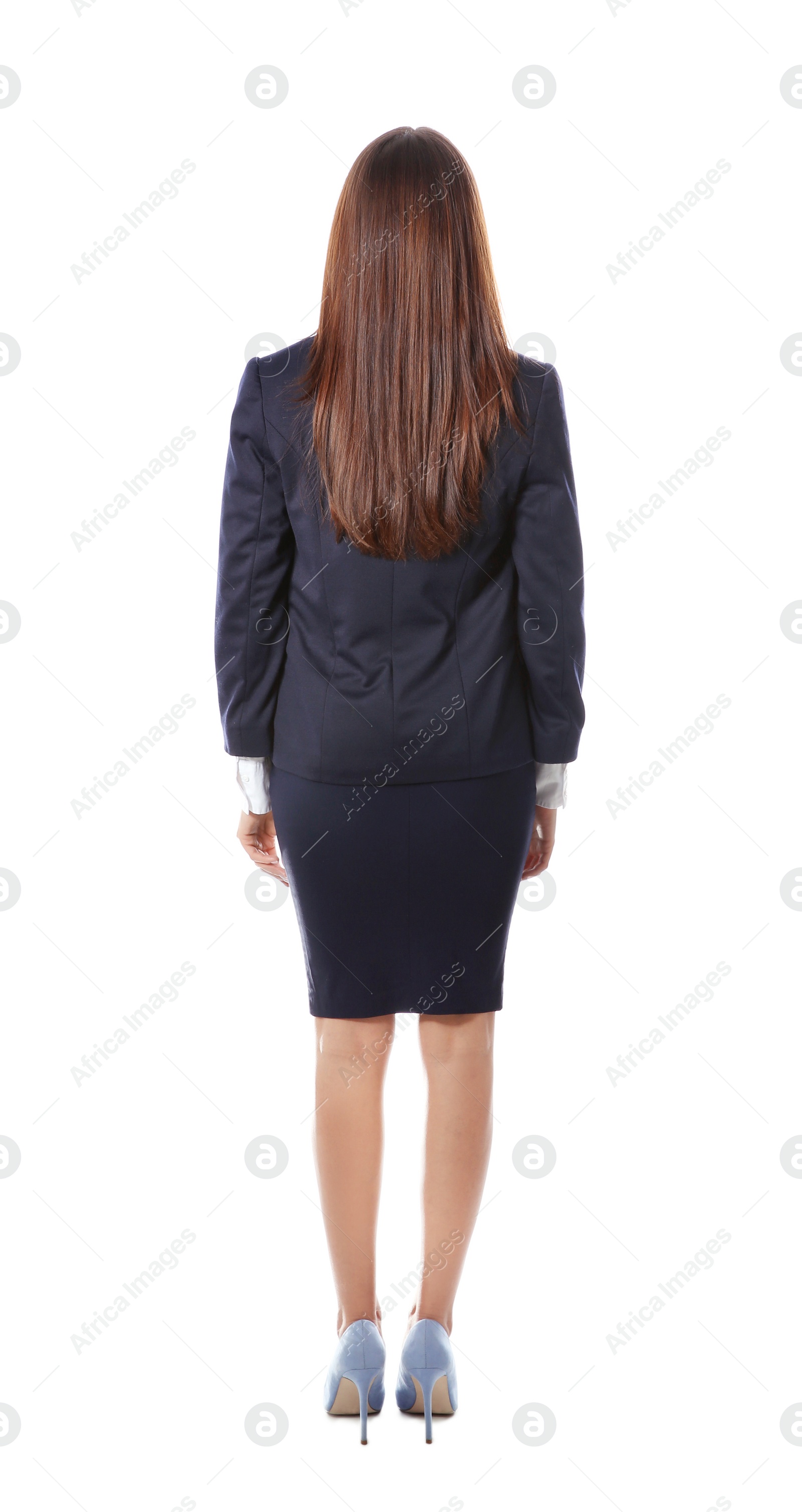 Photo of Young businesswoman in office suit posing on white background