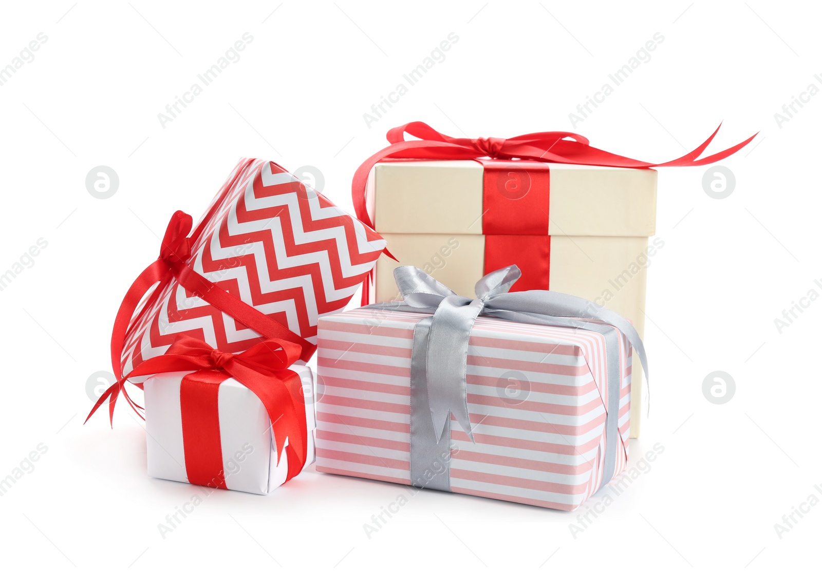 Photo of Beautifully decorated gift boxes on white background