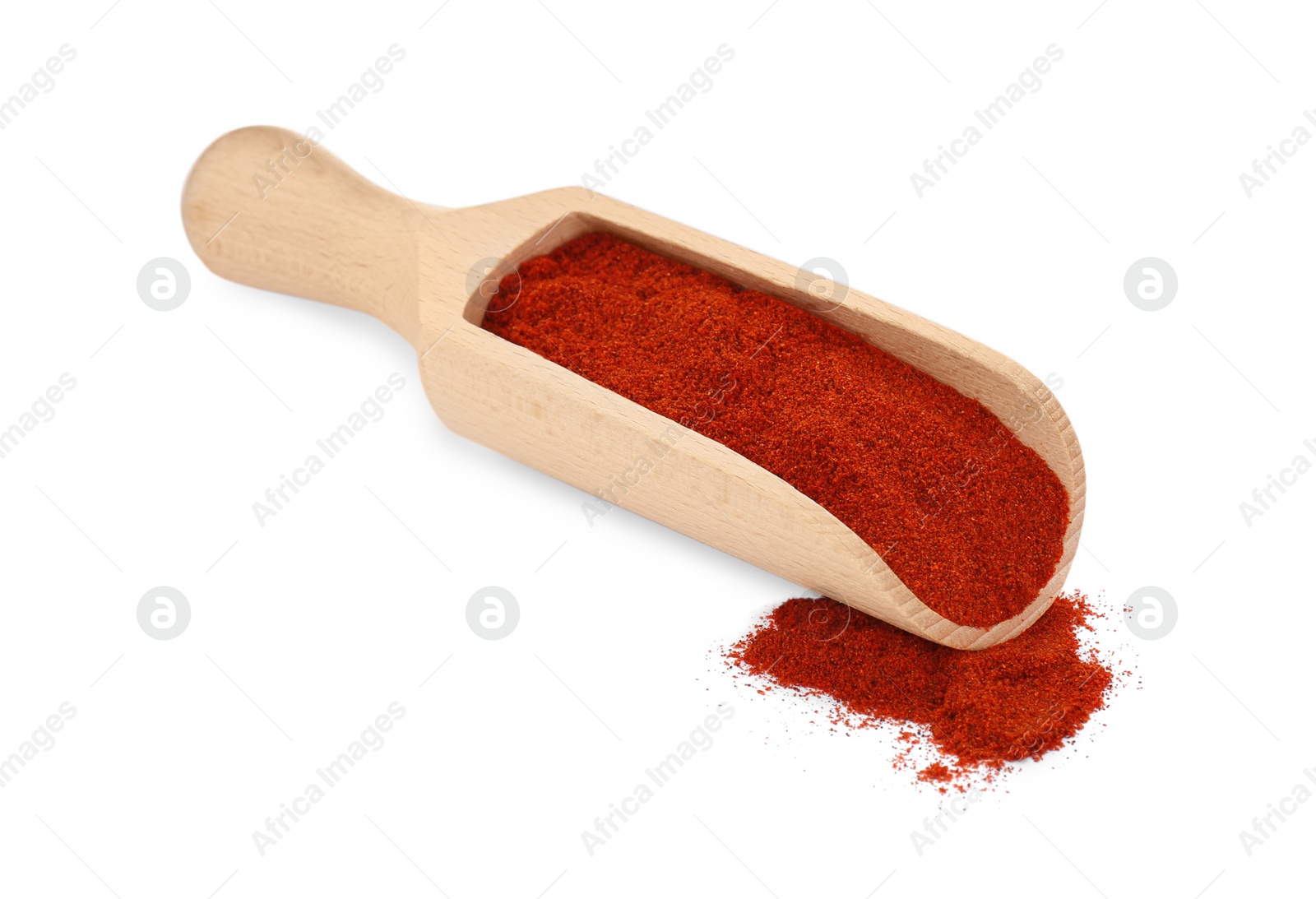 Photo of Scoop of aromatic paprika isolated on white