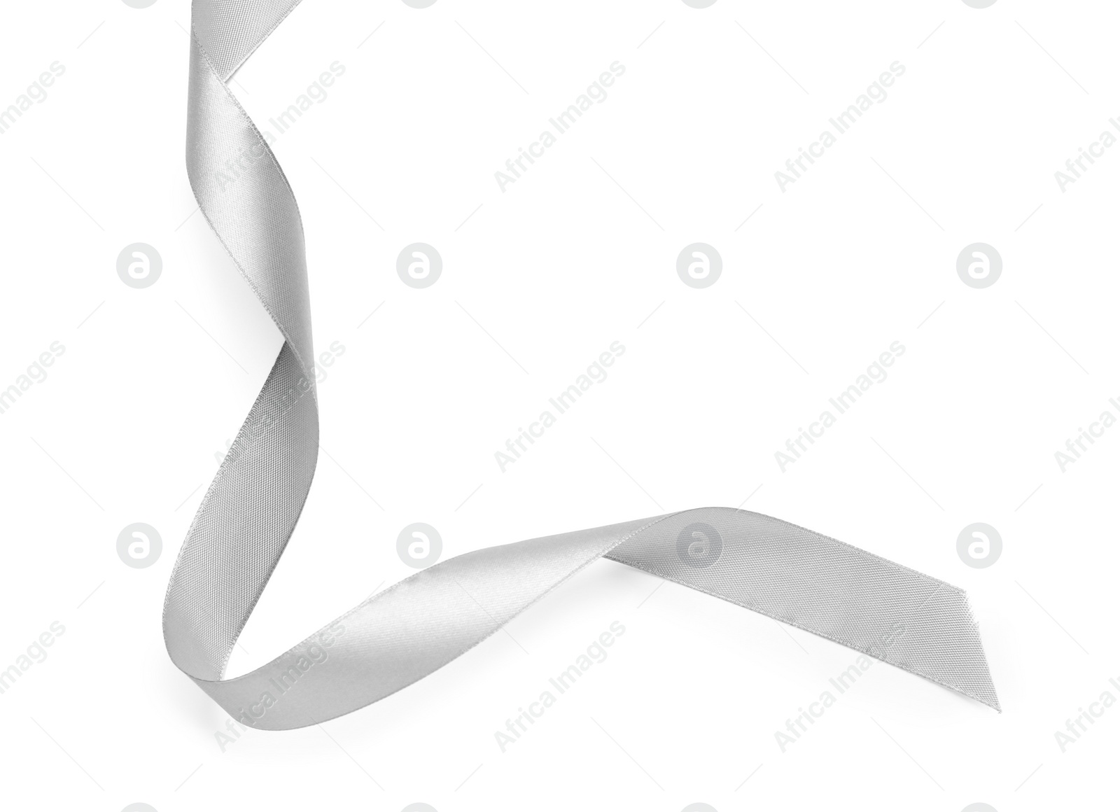 Photo of Beautiful silver ribbon isolated on white, top view