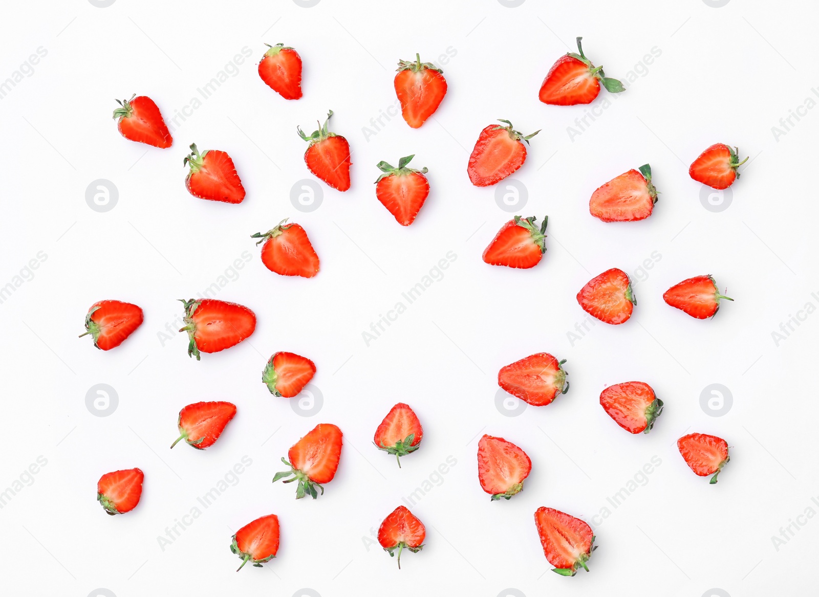 Photo of Composition with ripe red strawberries on light background