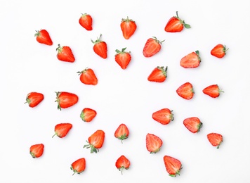 Composition with ripe red strawberries on light background