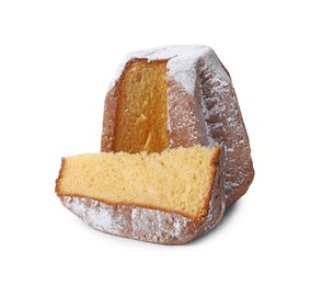 Photo of Delicious Pandoro cake decorated with powdered sugar isolated on white. Traditional Italian pastry