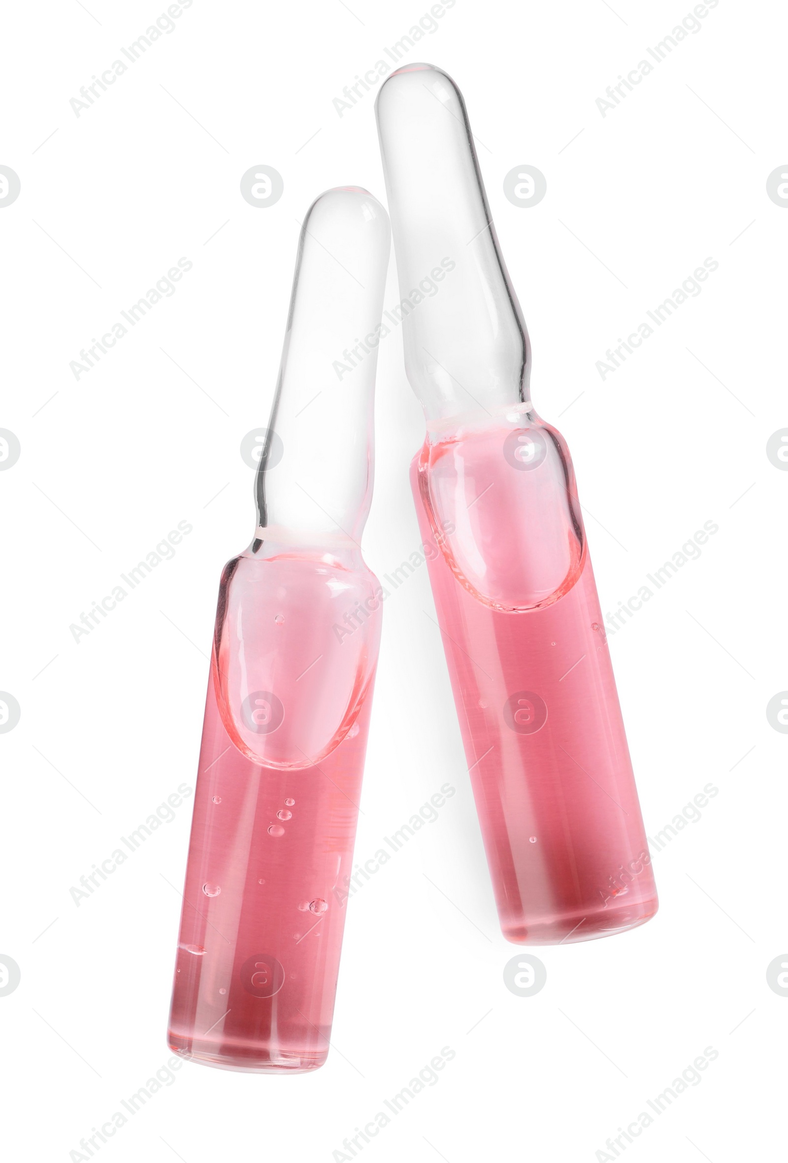 Photo of Glass ampoules with pharmaceutical product on white background, top view