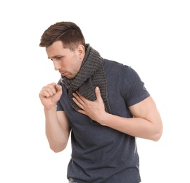Young man coughing on white background
