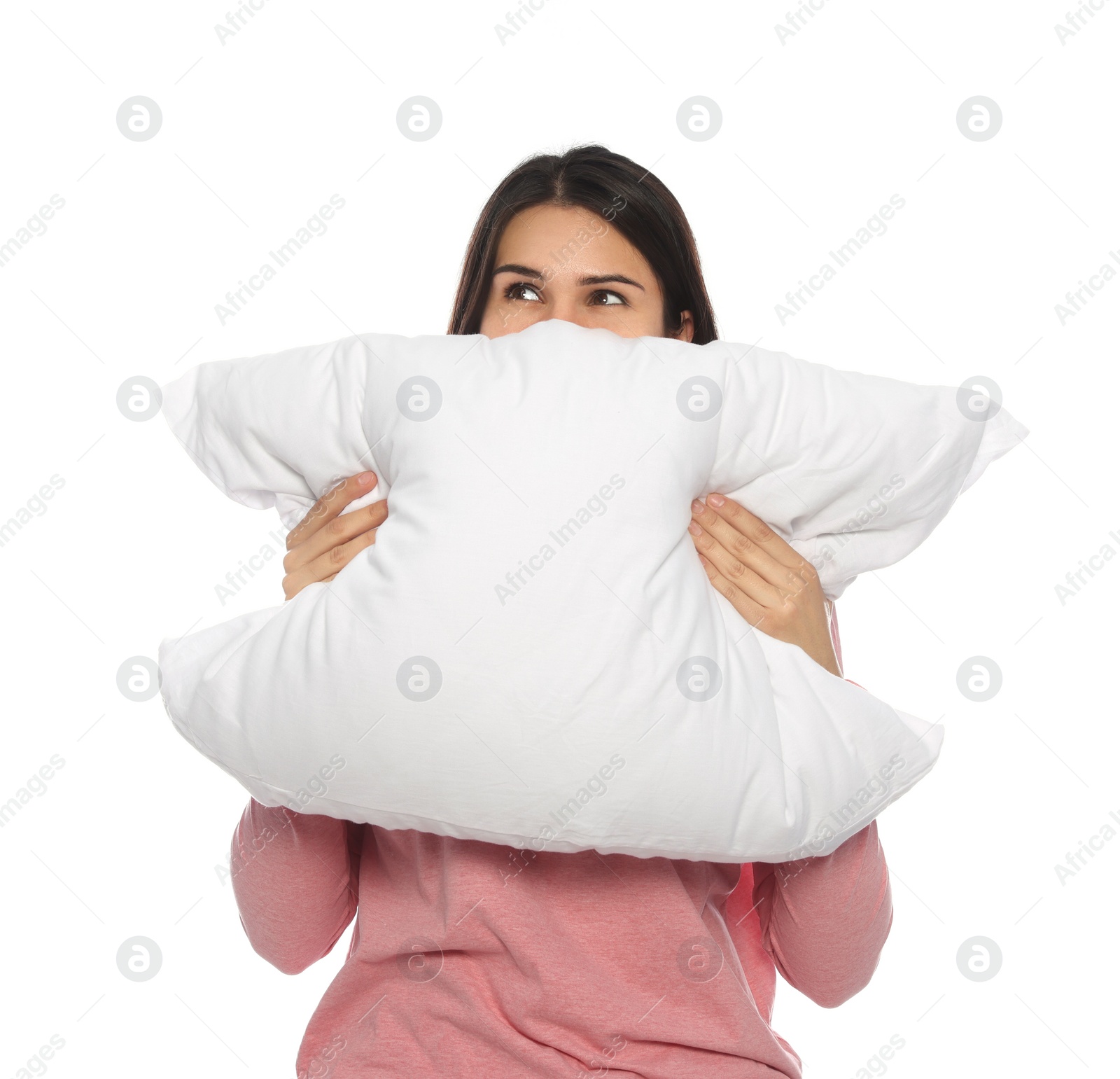 Photo of Young woman covering face with pillow on white background