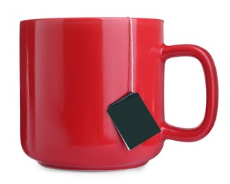 Red cup with teabag isolated on white